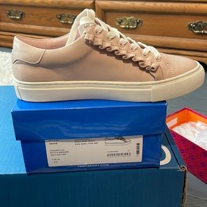 Tory Burch ruffle sneaker.